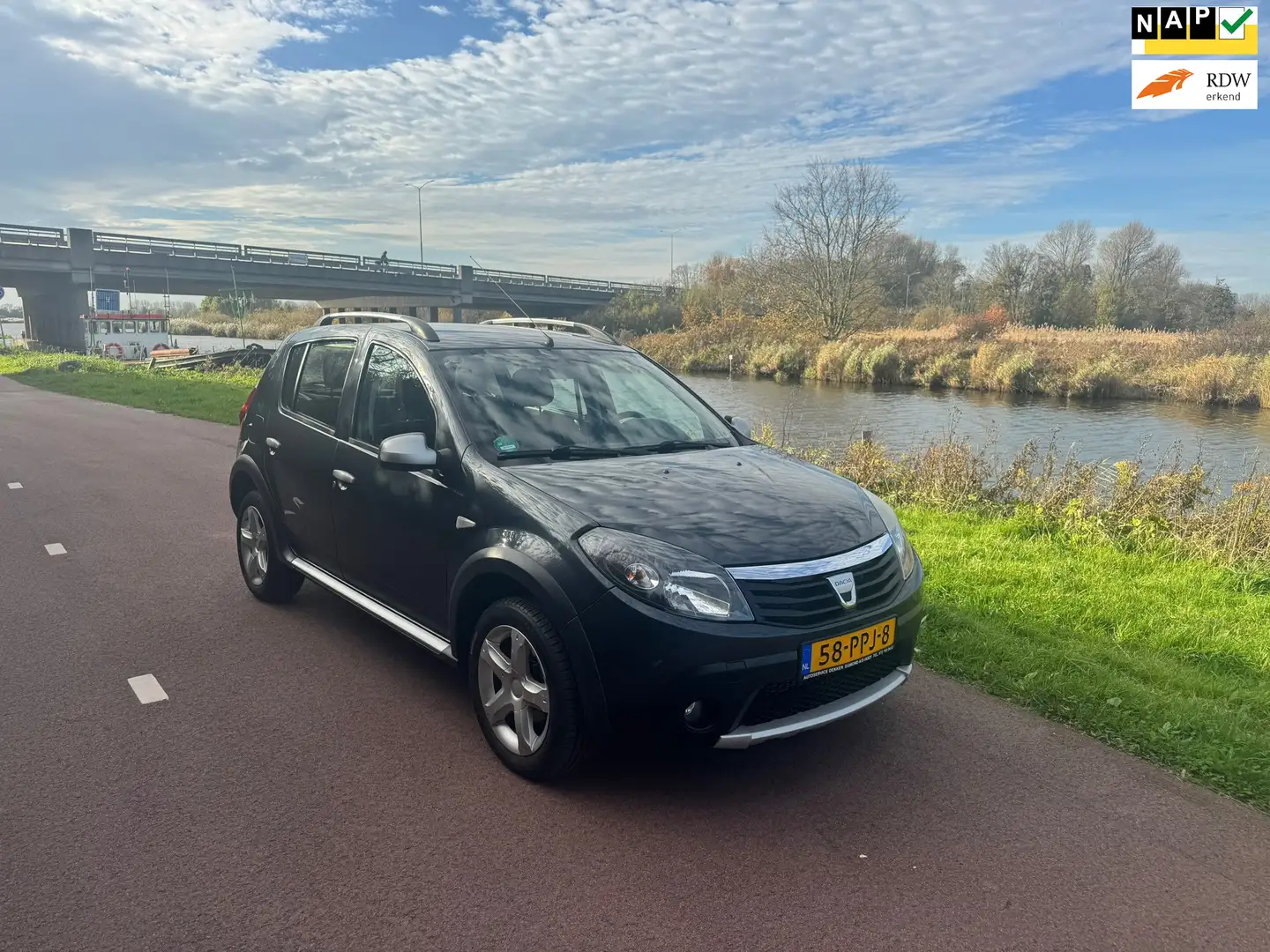Dacia Sandero 1.6 Stepway|Airco| Grijs - 1