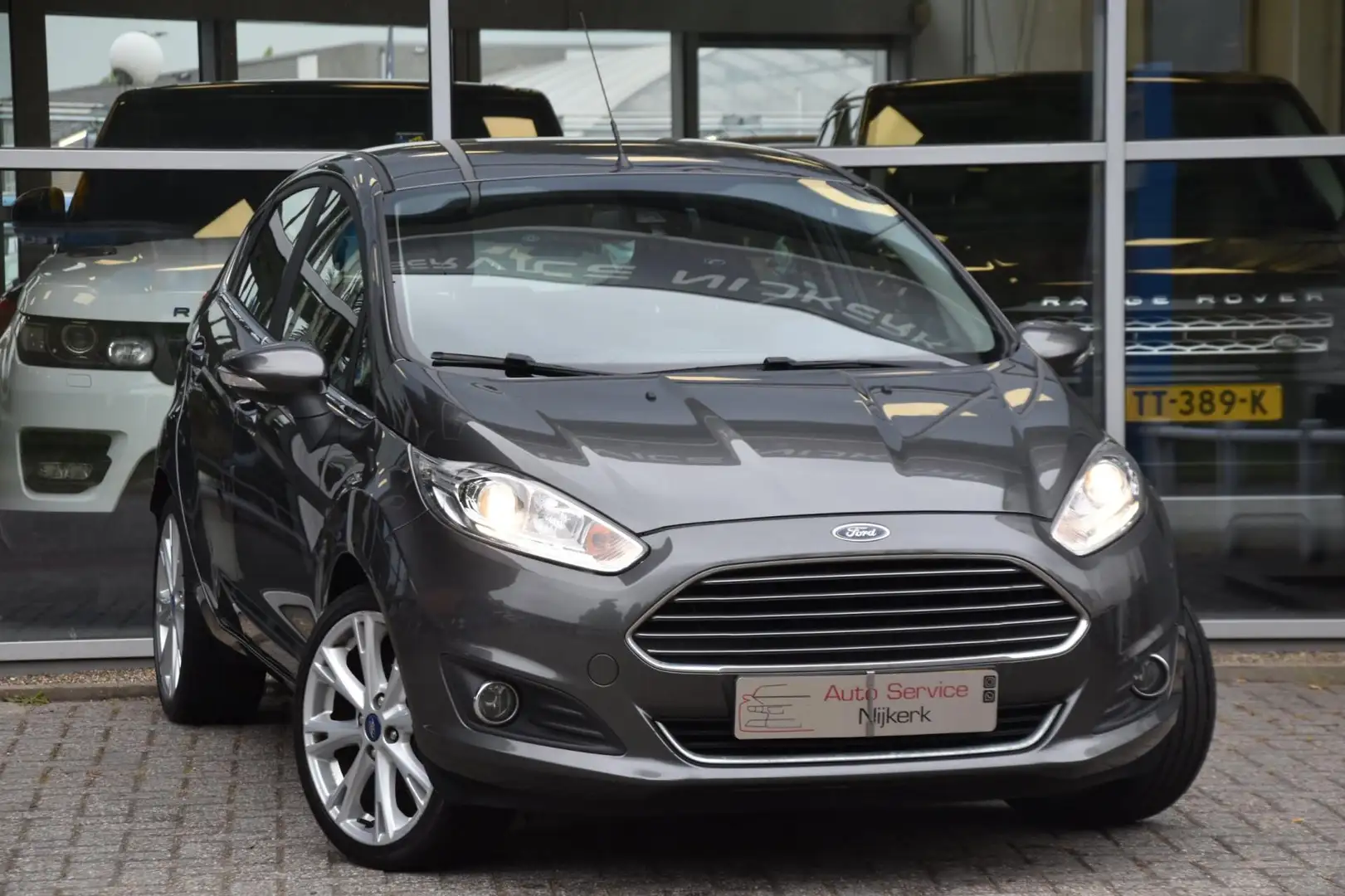 Ford Fiesta 1.0 EcoBoost Titanium Airco Navi. Pdc Start Stop 1 Grijs - 1