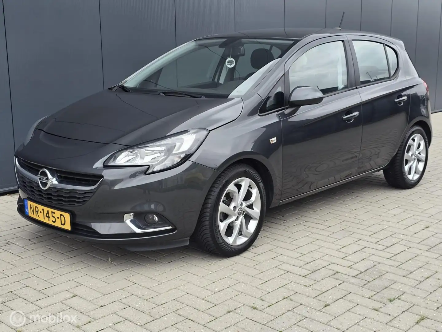 Opel Corsa 1.4, 5Drs, Dealer-onderhouden. Grijs - 1