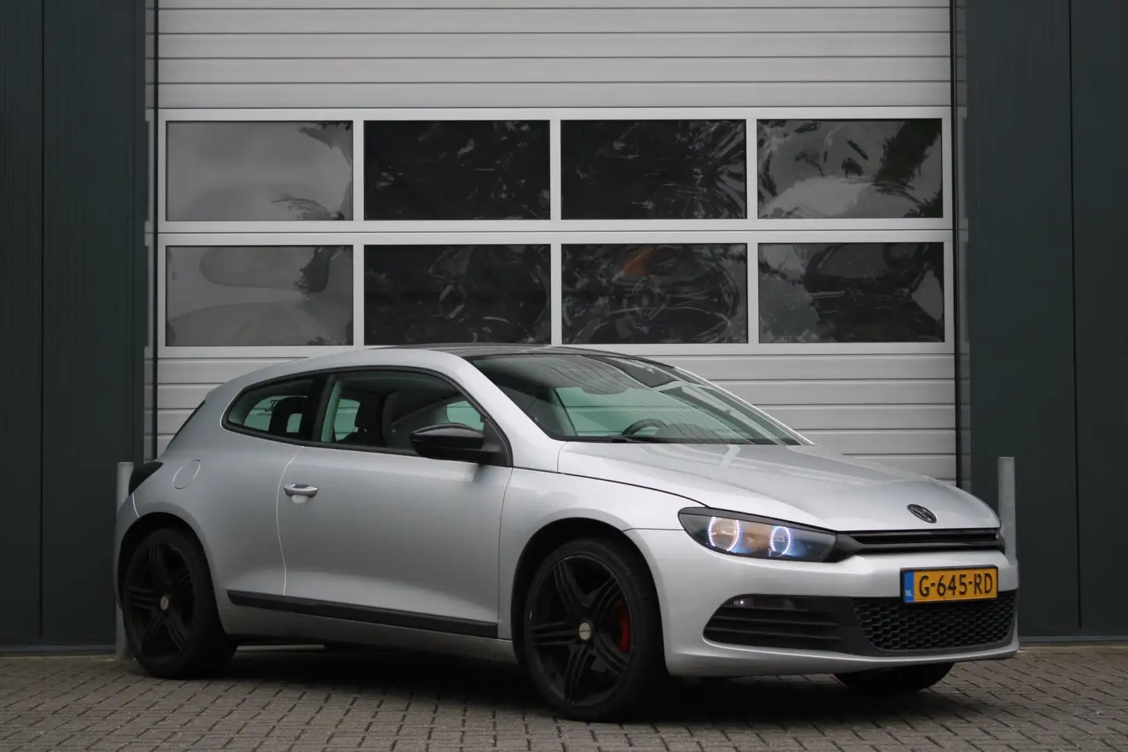 Volkswagen Scirocco 1.4 TSI Highline Clima/Cruise/Navi/Bluetooth/Stoel Gris - 1
