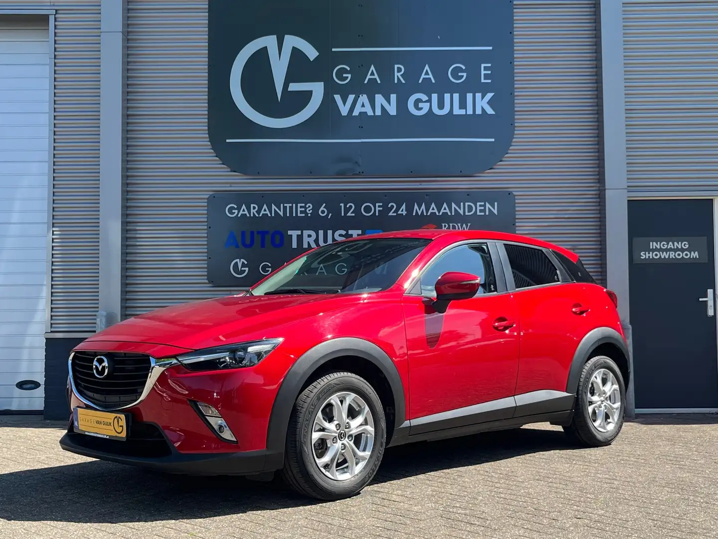 Mazda CX-3 2.0 SkyActiv 120PK Navi,Clima,Cruise,Stoelverw,Iso Rood - 1