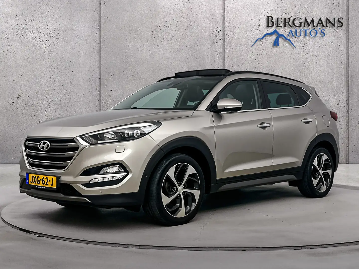 Hyundai TUCSON 1.6 T-GDi Premium 4WD // DEALERONDERHOUDEN // LEDE Gris - 1