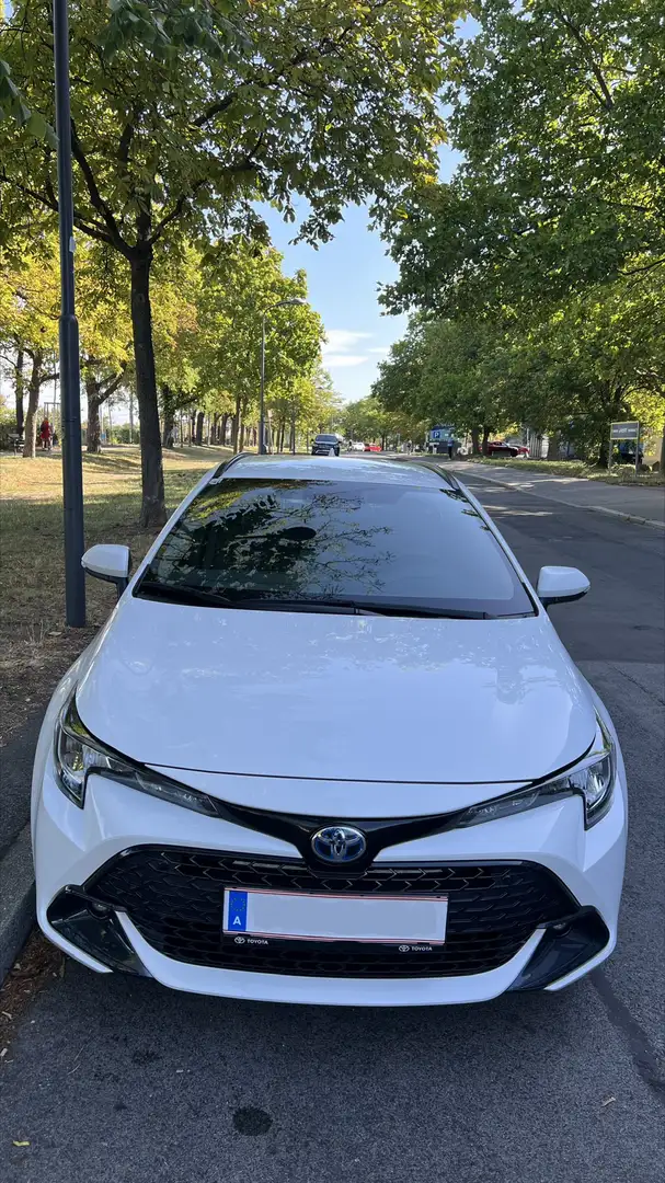 Toyota Corolla 2. 0 Hybrid Touring Sports Business Edition Weiß - 1