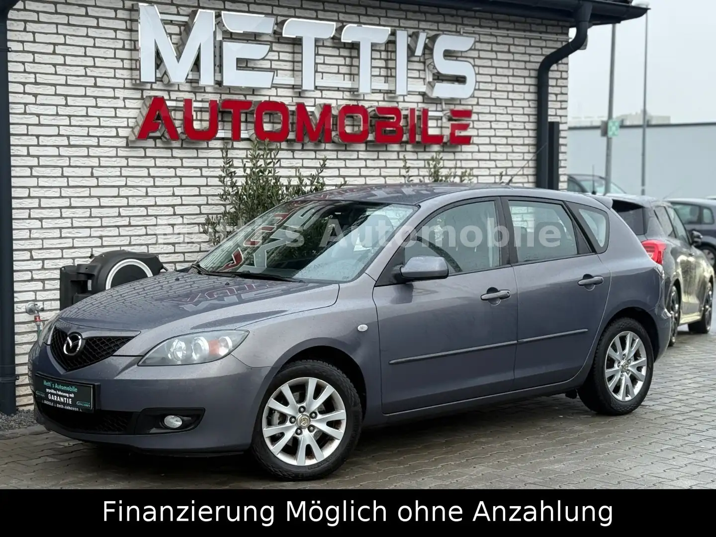 Mazda 3 Lim. 1.6 Sport Comfort Grau - 1