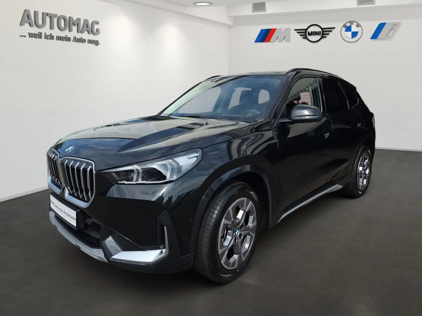 BMW X1 sDrive18i X-Line*AHK*DriveAssistPlus*ParkAssistPlu Schwarz - 1