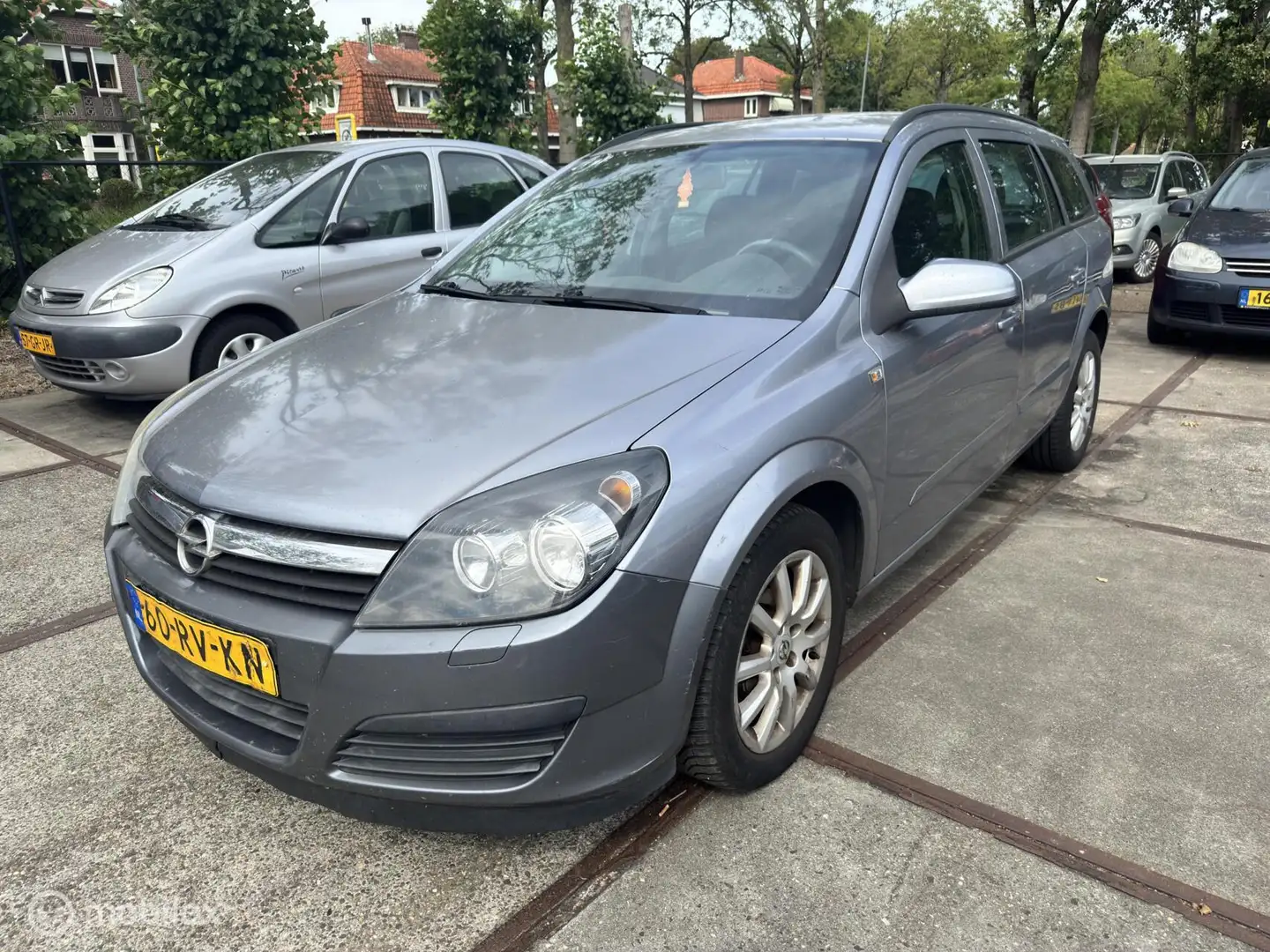 Opel Astra Wagon 1.6 Enjoy Grijs - 1