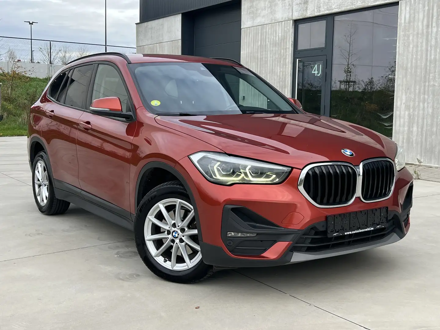 BMW X1 sDrive18d AUTOMAAT Euro 6d/ LED/ NAVI/ GEKEURD Rood - 1