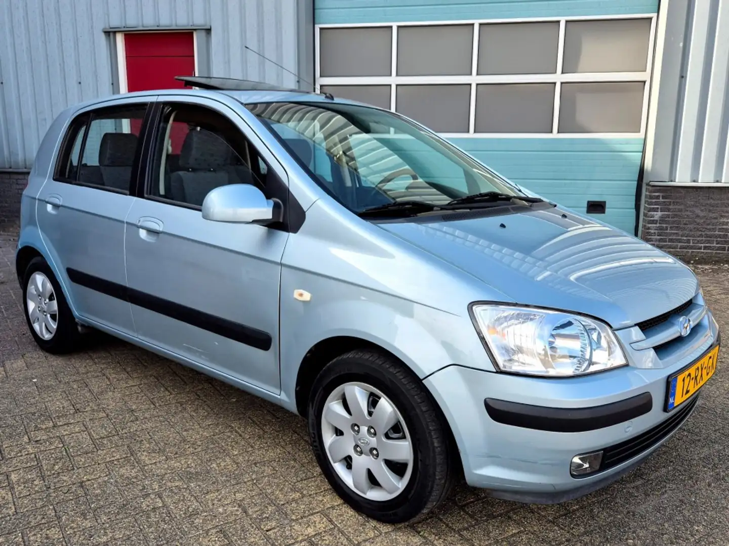 Hyundai Getz 1.3i Dynamic Airco 94624 km NAP Nieuwe APK Blauw - 1