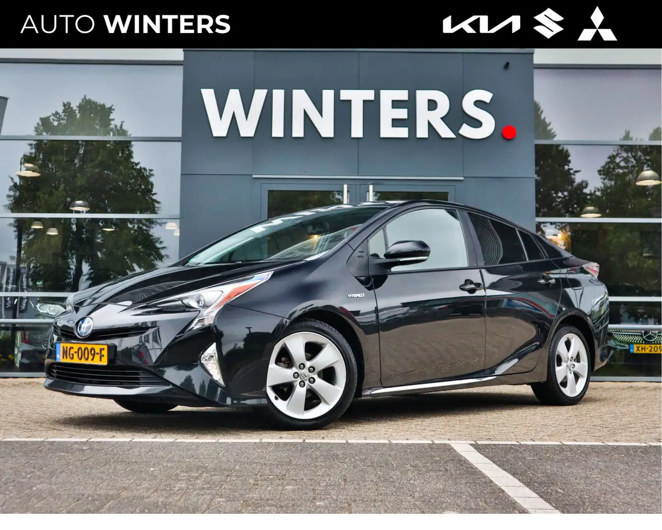 Toyota Prius 1.8 First Edition ECC-Airco Navi+BT+DAB+Camera Cr. Černá - 1