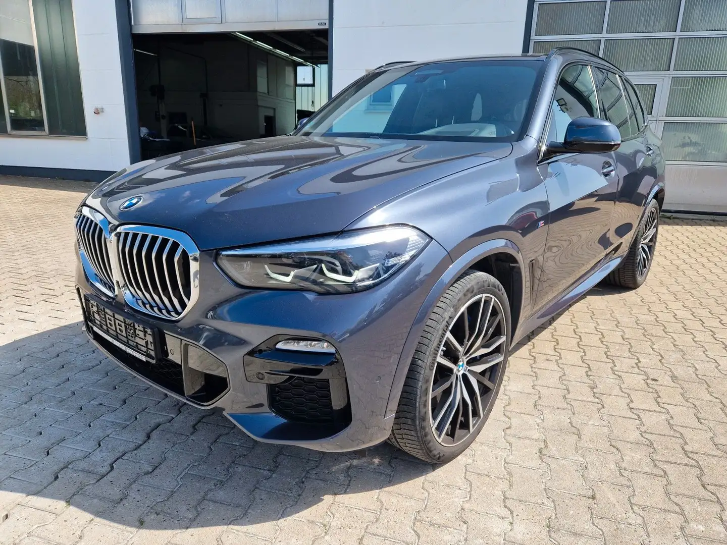 BMW X5 xDrive 40 i M Sport 1.Hd/22''/AHK/St-Hzg/e.SD Gris - 1