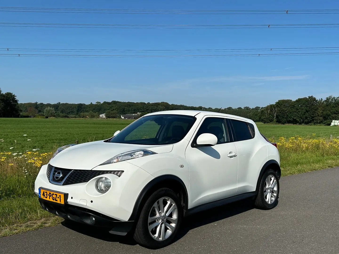 Nissan Juke 1.6 DIG-T Acenta, Leer, Navi, Cruise, Keyless, ECC Wit - 2