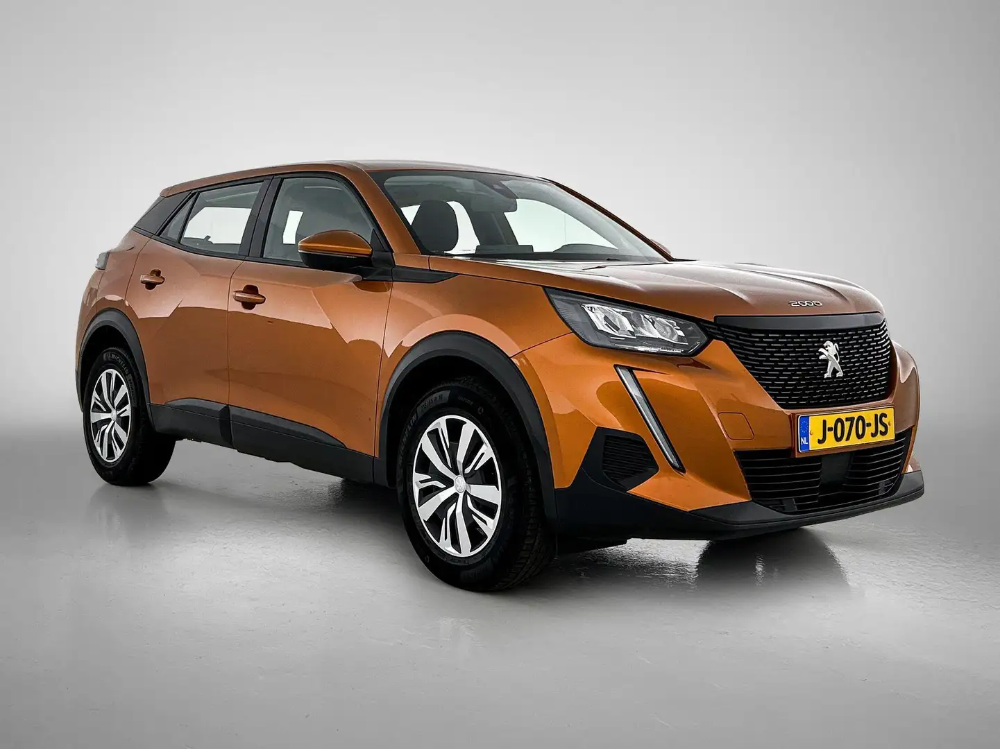 Peugeot 2008 SUV Active 100pk | Navigatie | Airco | Cruise Cont Orange - 2