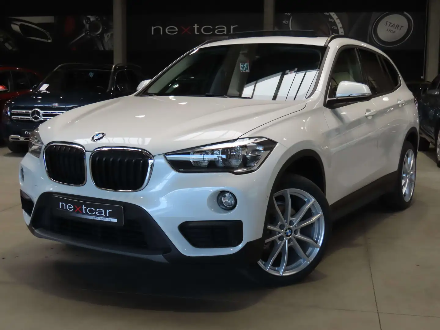 BMW X1 16dA SDrive*NAVI PRO-HUD-TOIT PANO-SIEGES CHAUFF** Blanc - 1