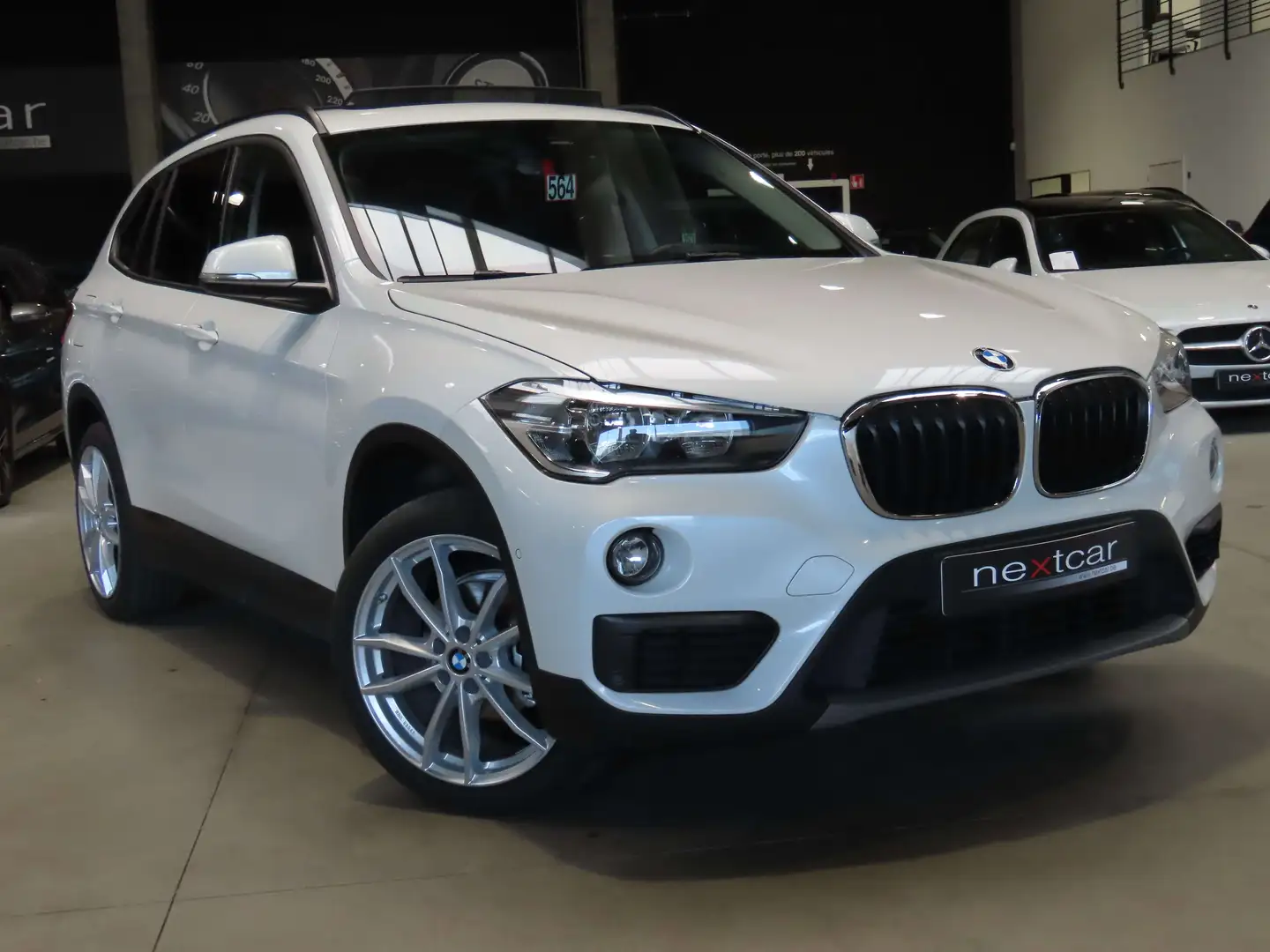 BMW X1 16dA SDrive*NAVI PRO-HUD-TOIT PANO-SIEGES CHAUFF** Blanc - 2