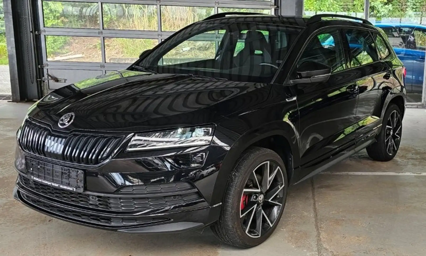 Skoda Karoq 2,0 Sportsline Schwarz - 1