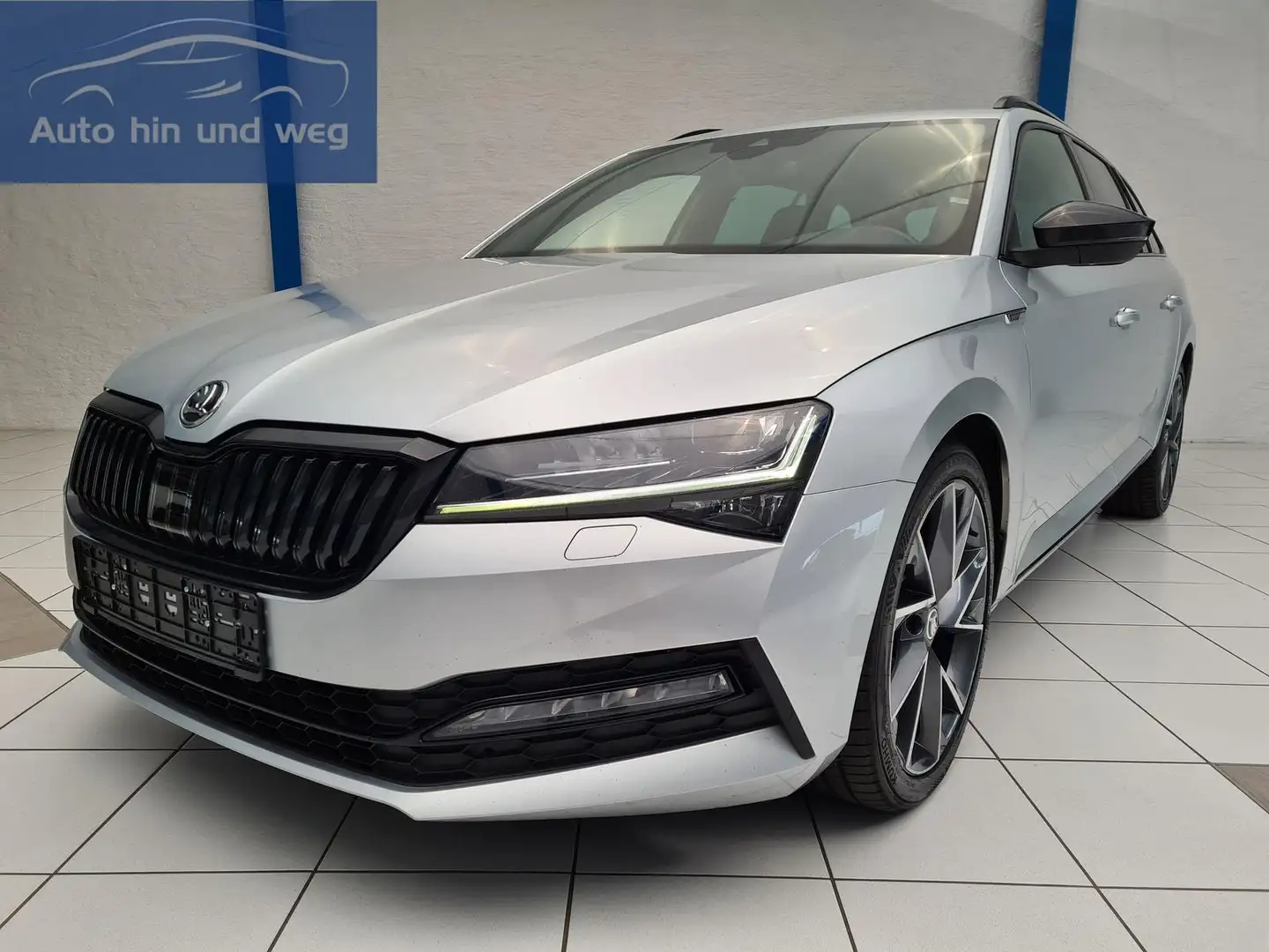 Skoda Superb Combi 2.0 TDI Sportline 4x4 | DCC Argent - 1