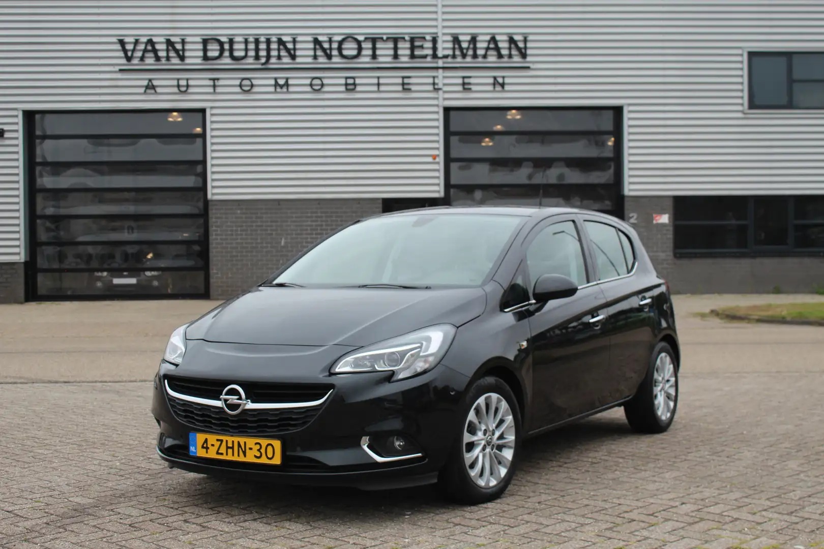 Opel Corsa 1.0 Turbo Cosmo / Carplay / Camera / N.A.P. Zwart - 1