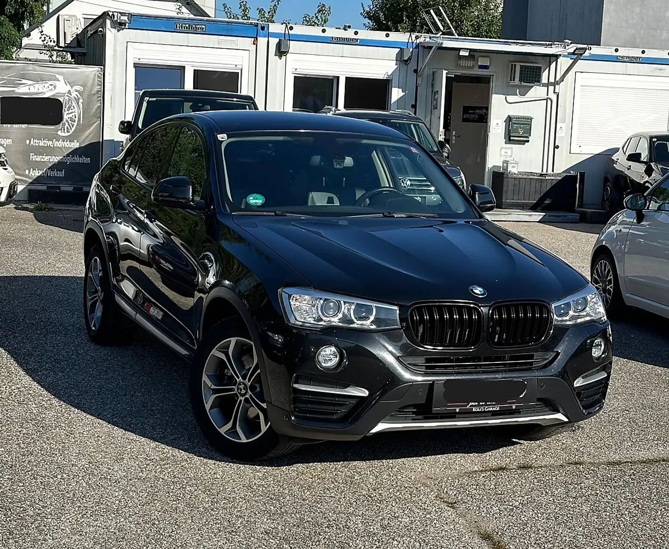 BMW X4 xDrive 20d Österreich-Paket Aut. Schwarz - 1