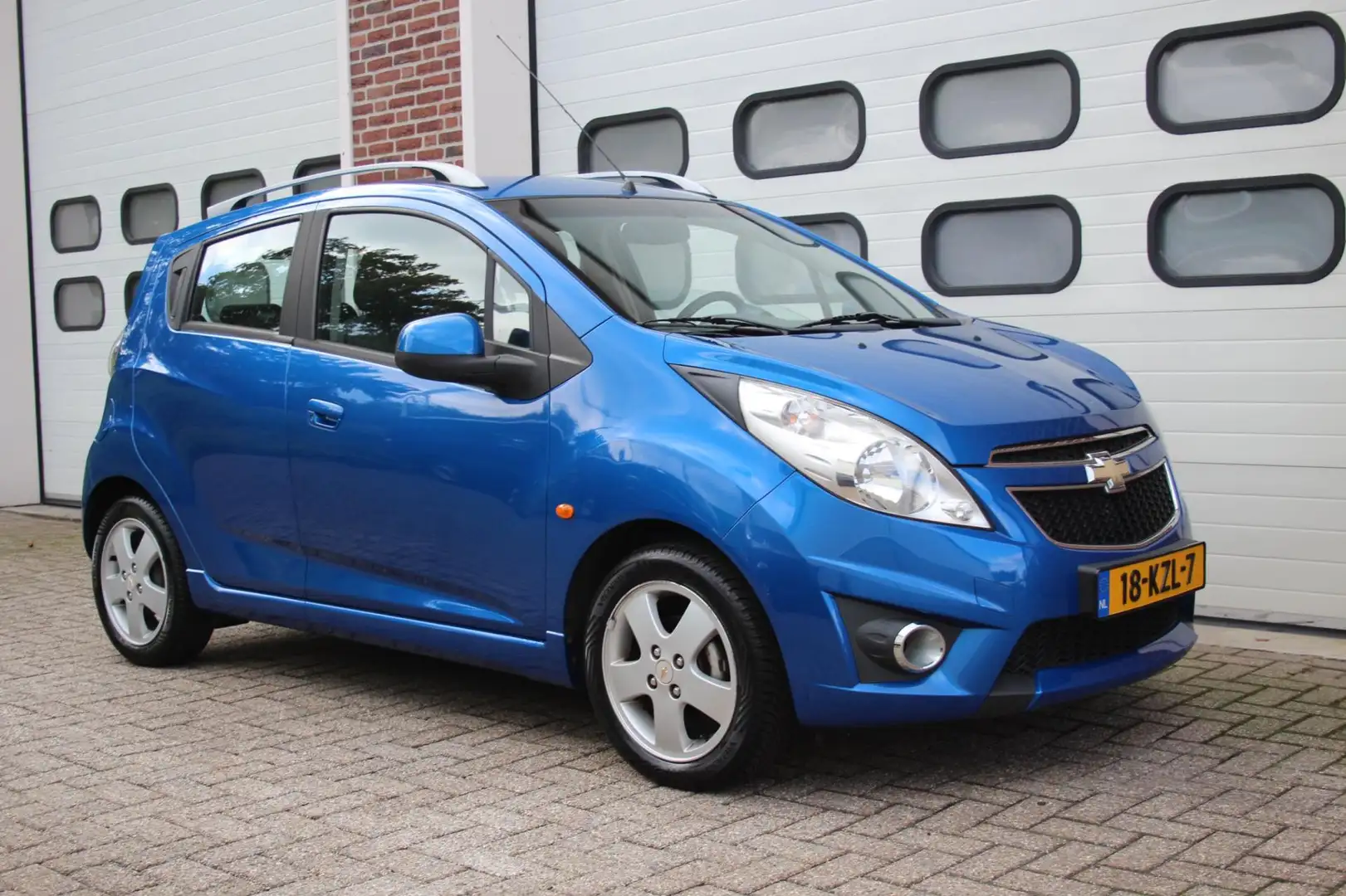 Chevrolet Spark 1.2 16V LT 5-Deurs * Airco / Nap / Trekhaak * Blauw - 1