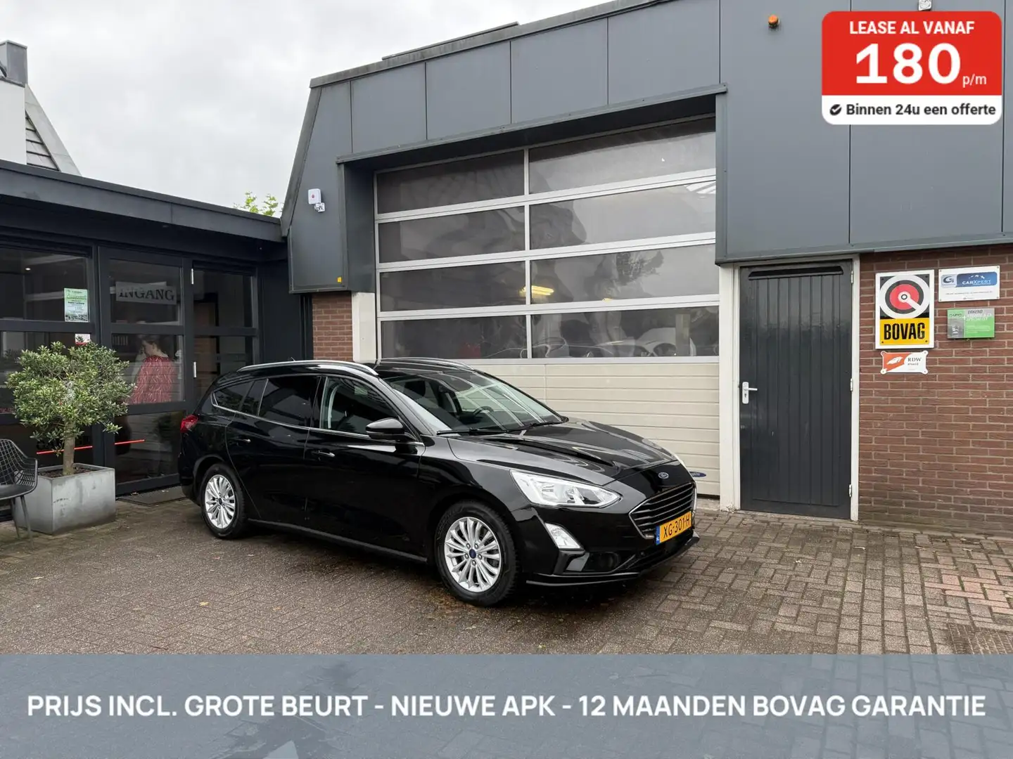 Ford Focus Wagon 1.0 EcoB.Titanium Bus. TH/CARPLAY *ALL-IN PR Zwart - 1