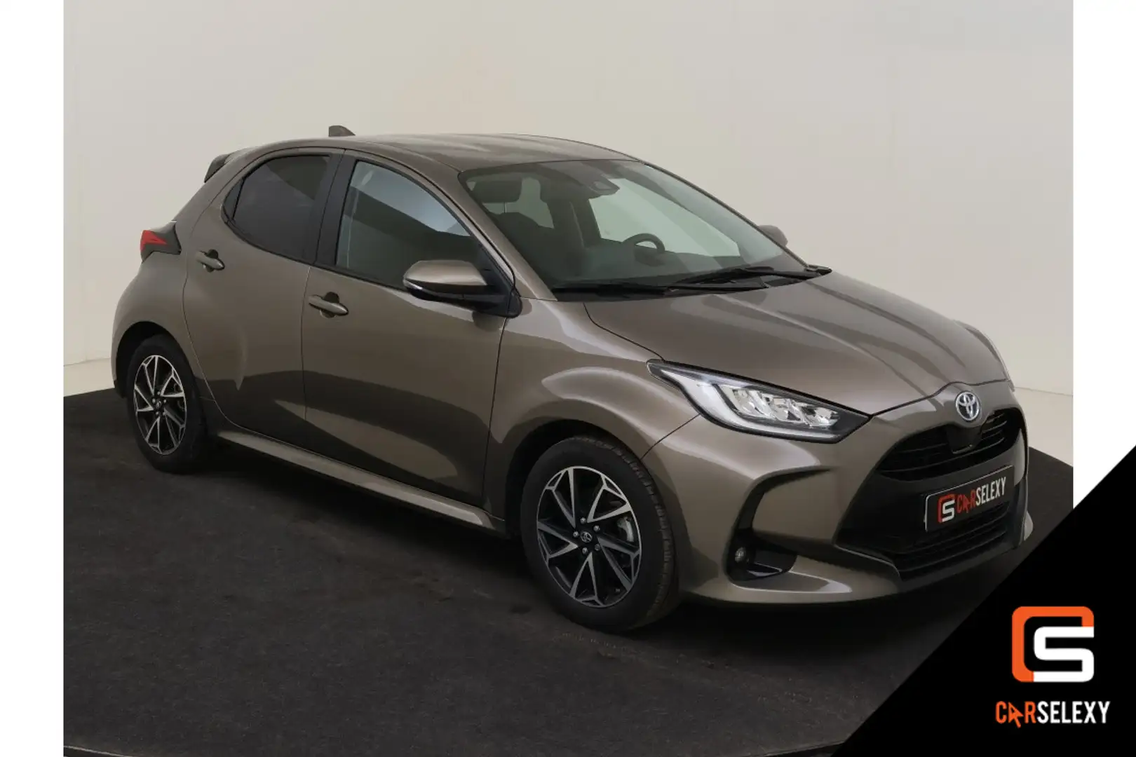 Toyota Yaris 1.5 Hybride Dynamic Slim, zuinig en helemaal van n Brun - 1