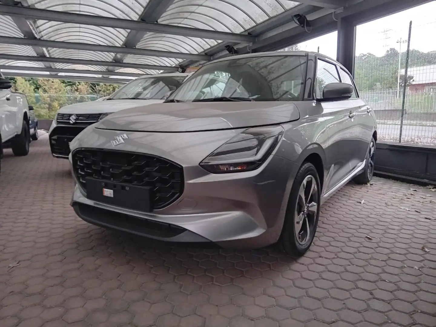 Suzuki Swift 1.2 Hybrid Waku Grau - 1