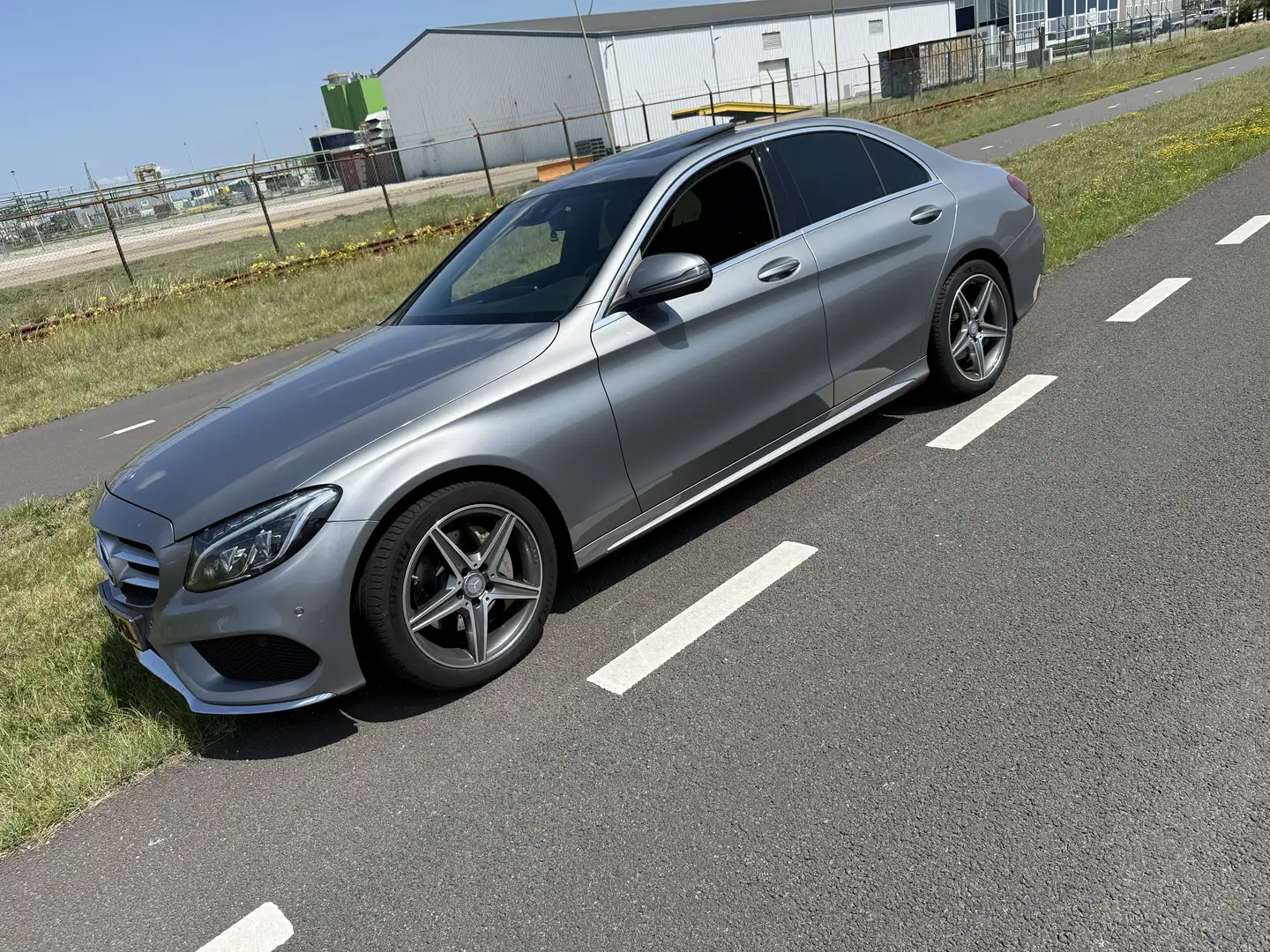 Mercedes-Benz C 180 Prestige AMG Line Grijs - 1