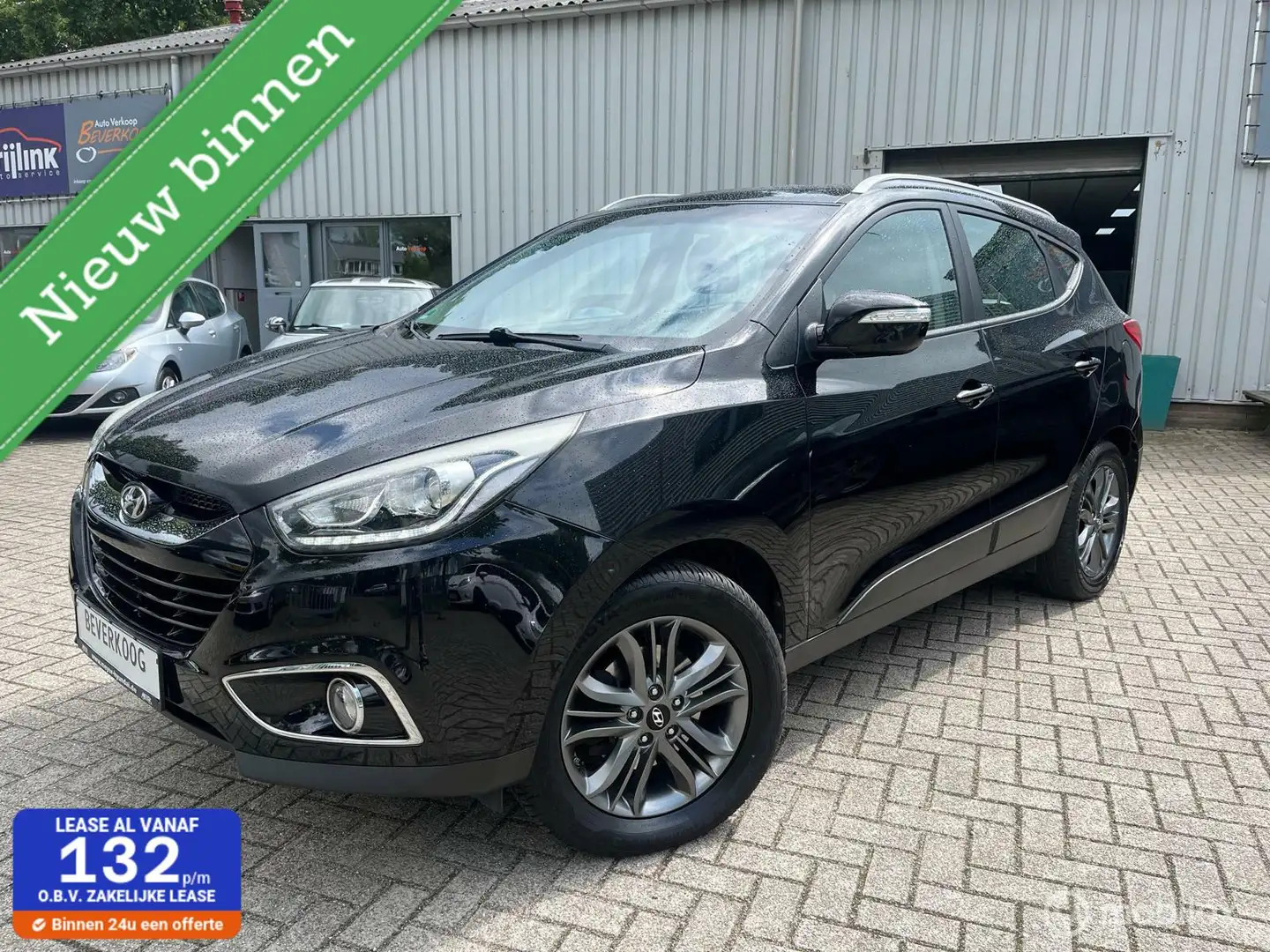 Hyundai iX35 1.6i GDI i-Drive 6/12 m garantie Zwart - 1
