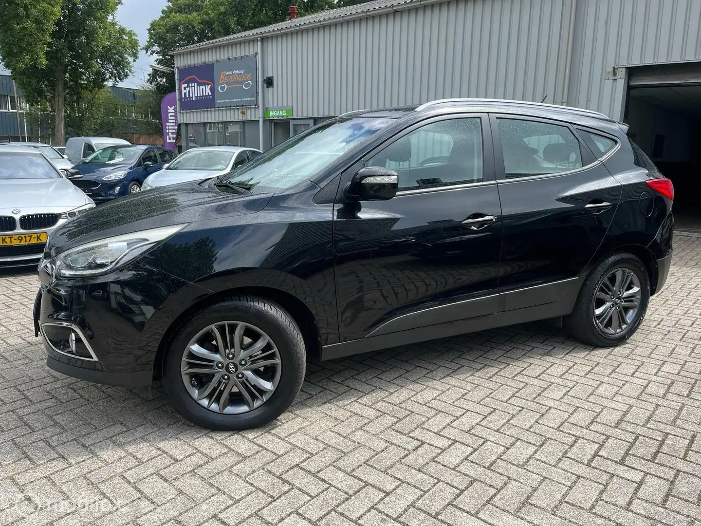 Hyundai iX35 1.6i GDI i-Drive 6/12 m garantie Zwart - 2