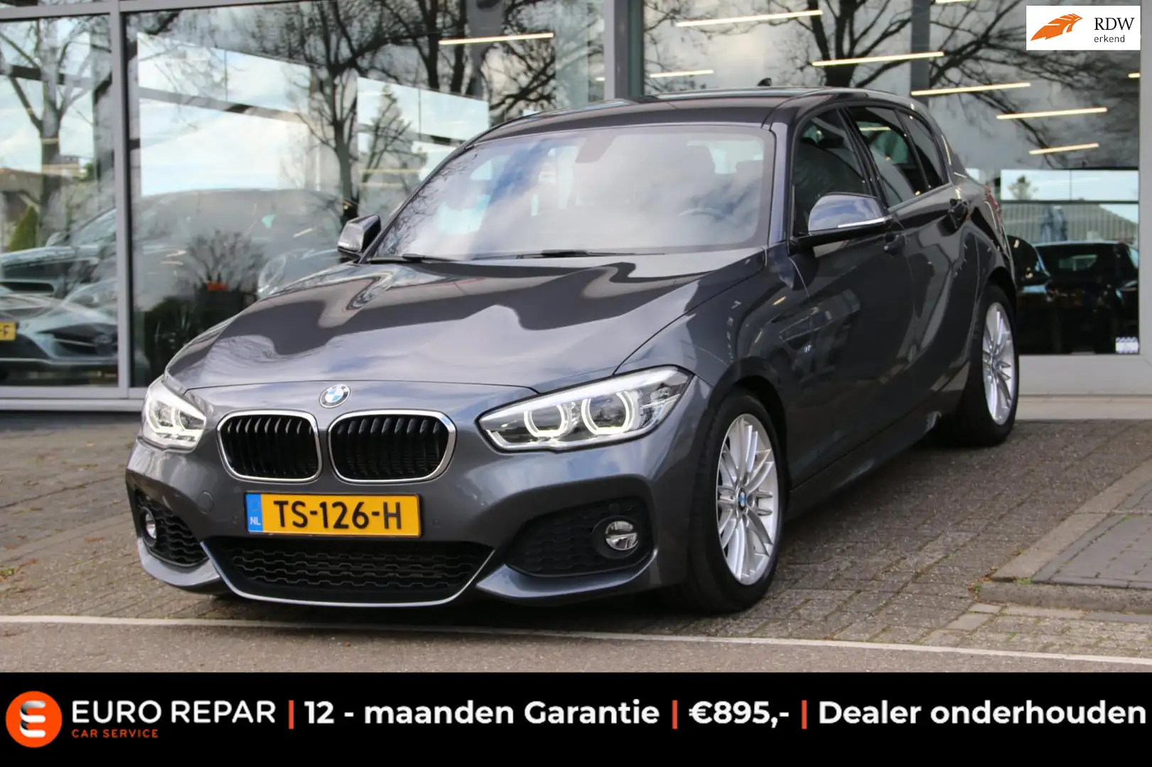 BMW 118 1-serie 118i Executive M-PAKKET DEALER OND. NL-AUT Grijs - 1