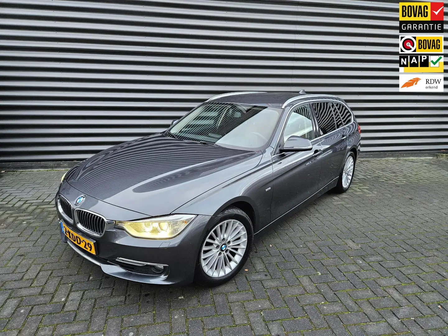 BMW 320 3-serie Touring 320i High Executive Grijs - 1