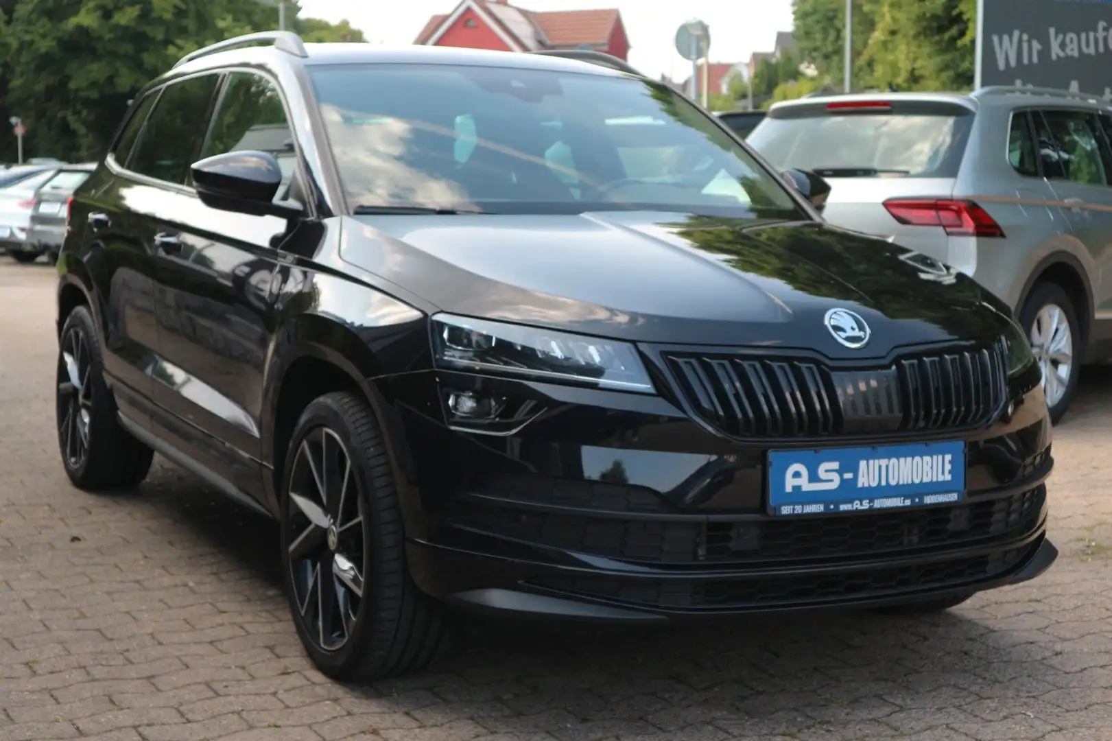 Skoda Karoq Ambition 4x4 *2.HD/DSG/RFK/PANO/NAV/AHK* Schwarz - 1