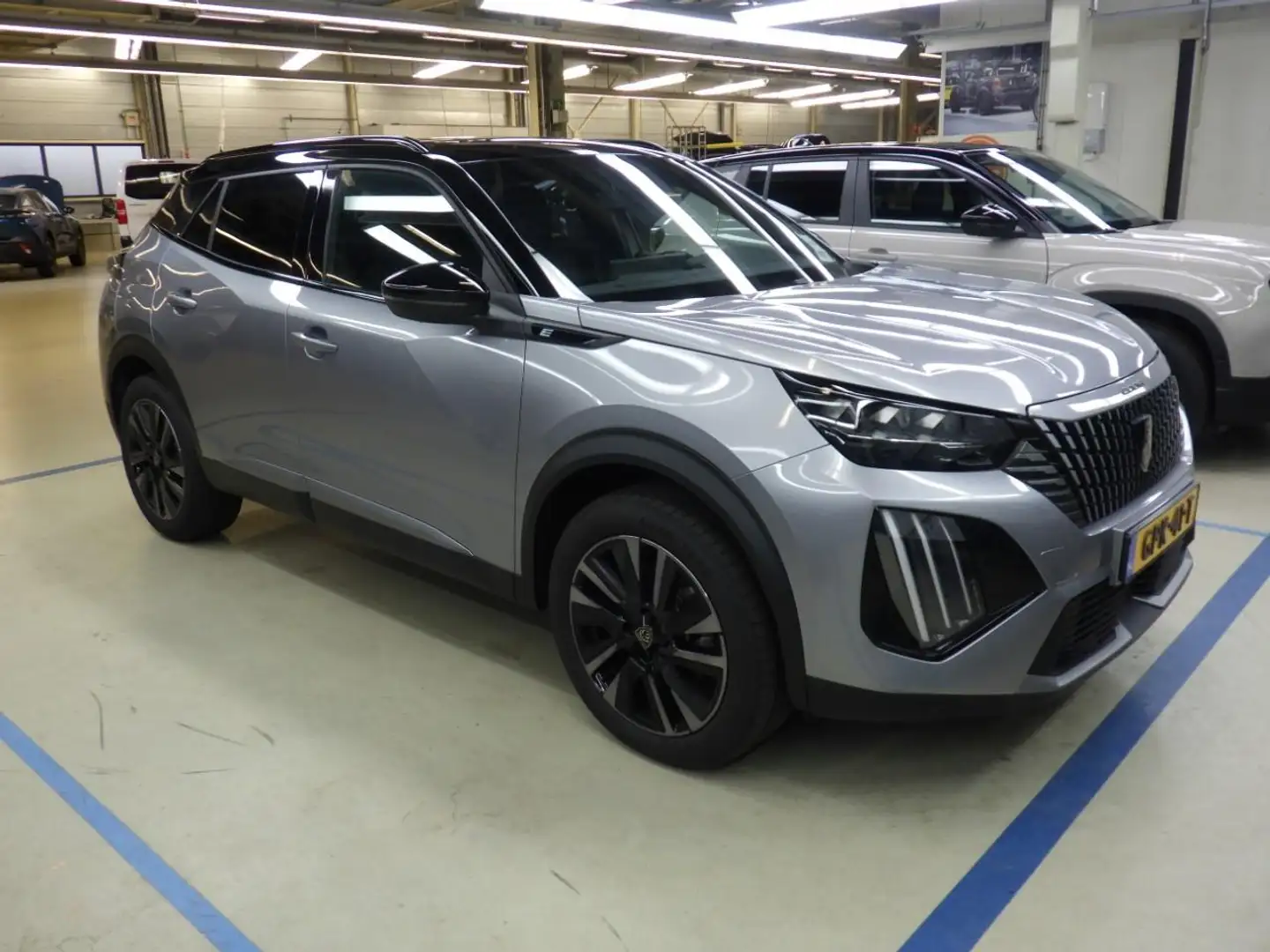Peugeot e-2008 EV GT 54 kWh 156pk | Schuif-/Kanteldak | Adaptive Gri - 2