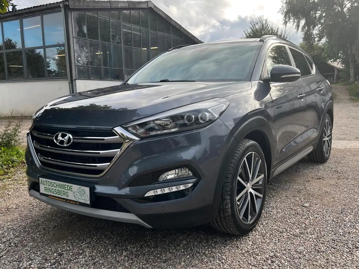 Hyundai TUCSON 1,6 T-GDI 7G-DCT Passion+ / AHK NAVI SHZ Grau - 1