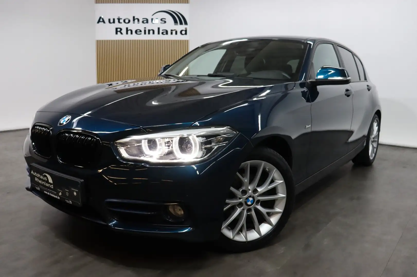 BMW 118 i Lim. 5-trg. Sportline*1.HAND*NAVI*LED Blau - 1