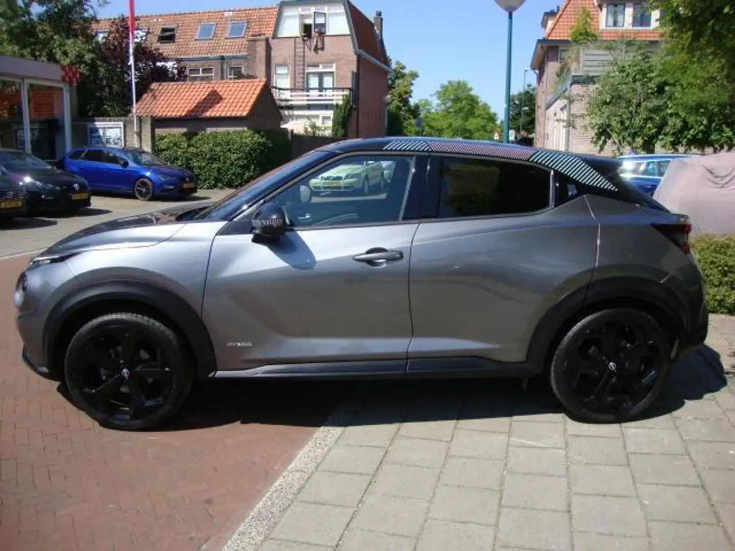 Nissan Juke 1.6 Hybrid Tekna Garantie mogelijlk tot 2033. Gris - 2