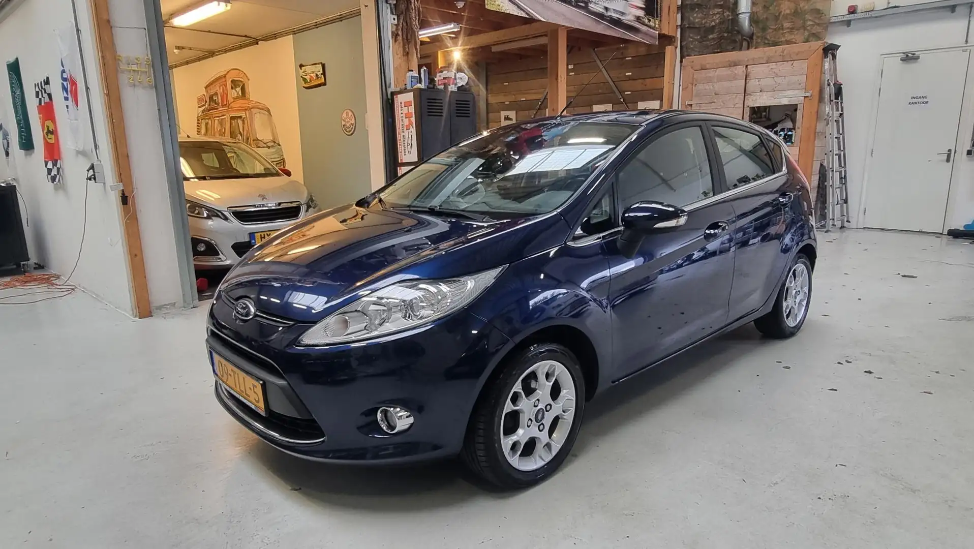 Ford Fiesta 1.25 Titanium Clima, Bluetooth, NAP, Cruisecontrol Blau - 1