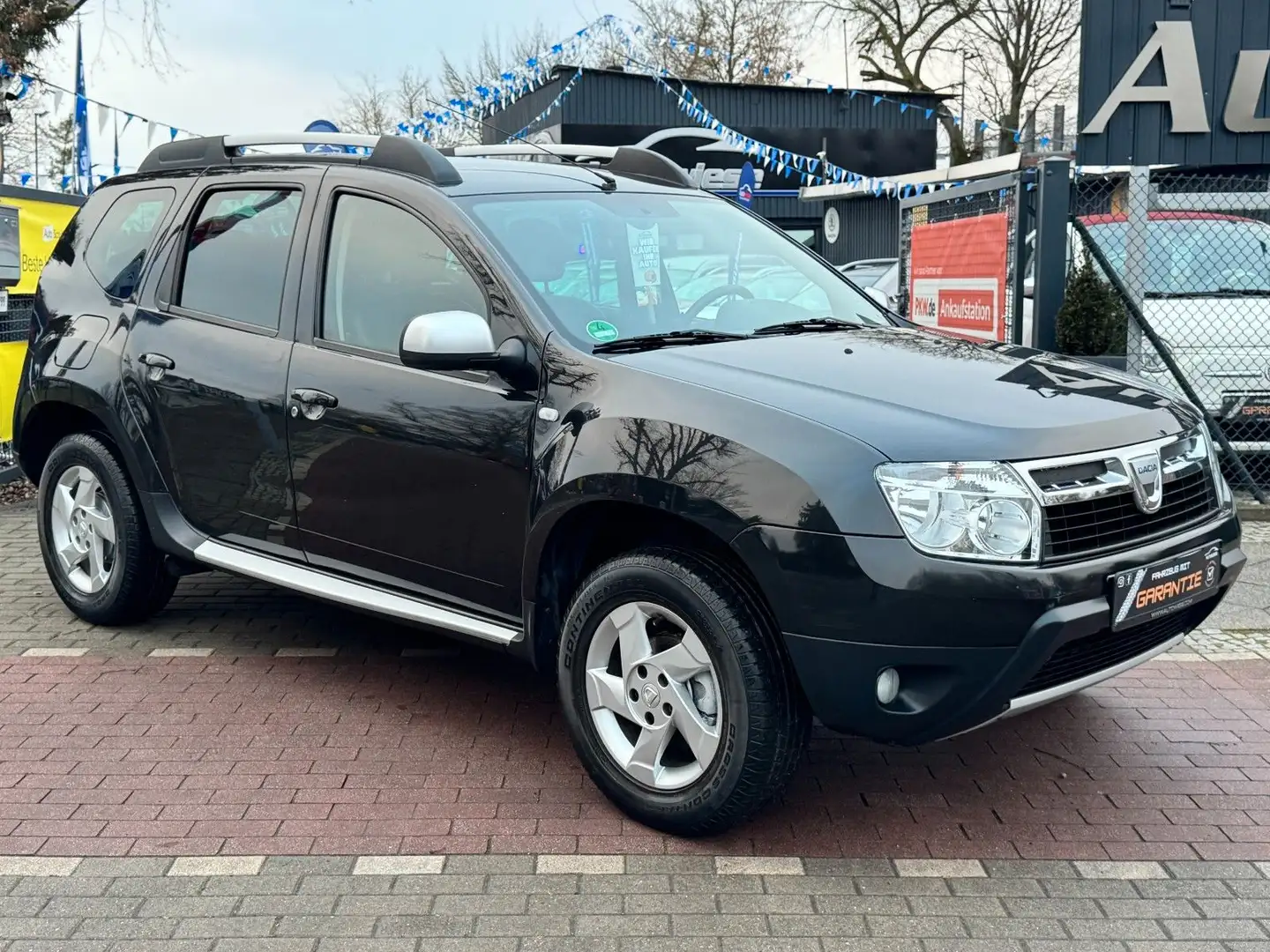 Dacia Duster I Prestige 4x2 1.6*Leder*Klima*Tüv NEU* Schwarz - 1