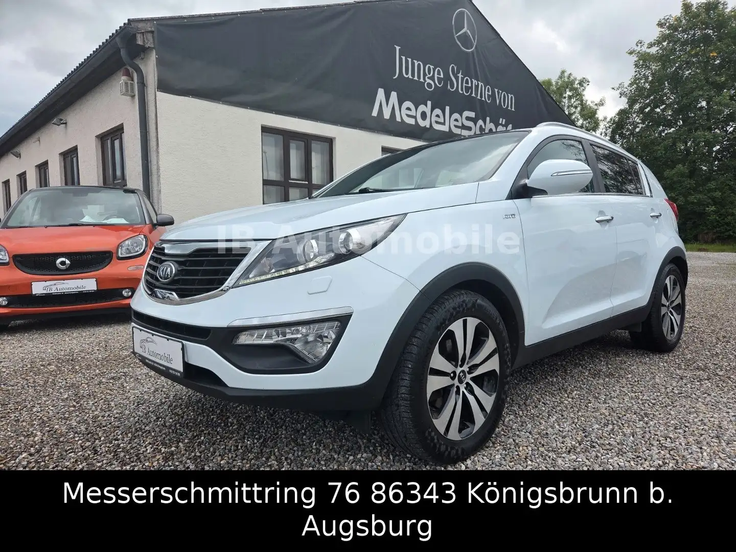 Kia Sportage 2.0 Spirit 4WD Autom*Navi*R.Kamera*Pano Weiß - 1