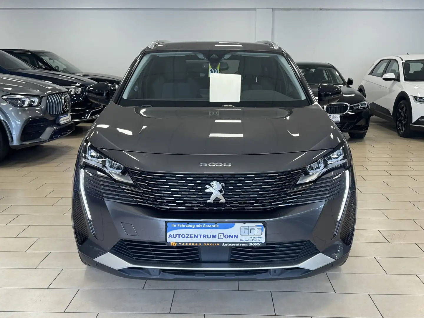 Peugeot 5008 Allure*7-Sitzer*LED*R-Cam*AHK*Navi*TeiLeder Серый - 2