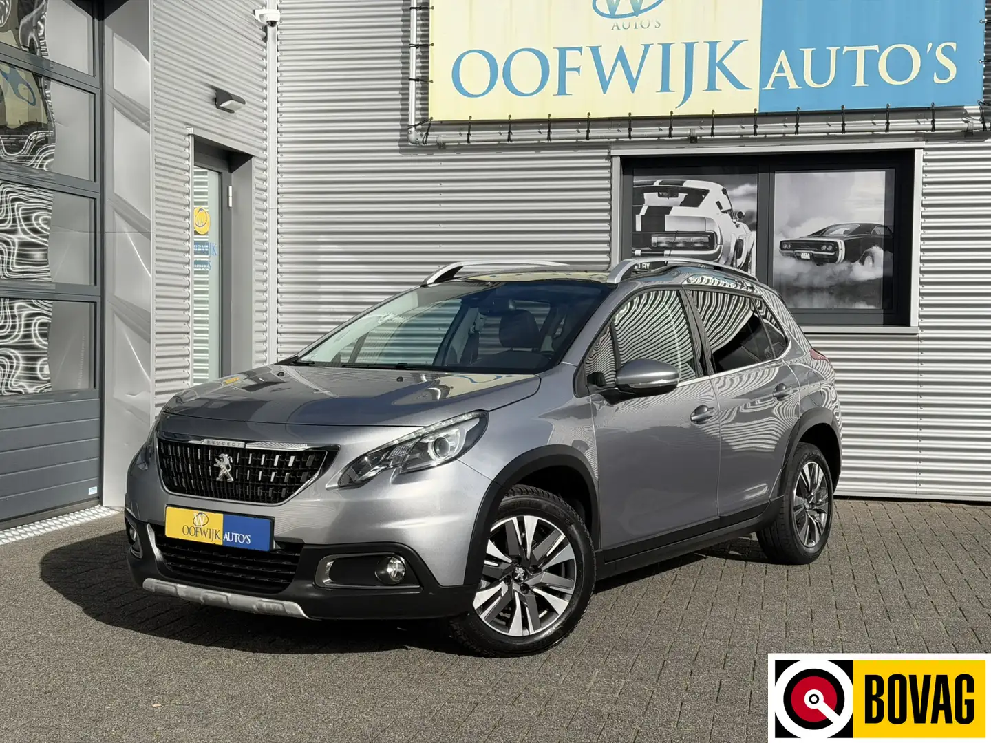 Peugeot 2008 1.2 PureTech Allure Automaat Clima Navi Pano Camer Grijs - 1