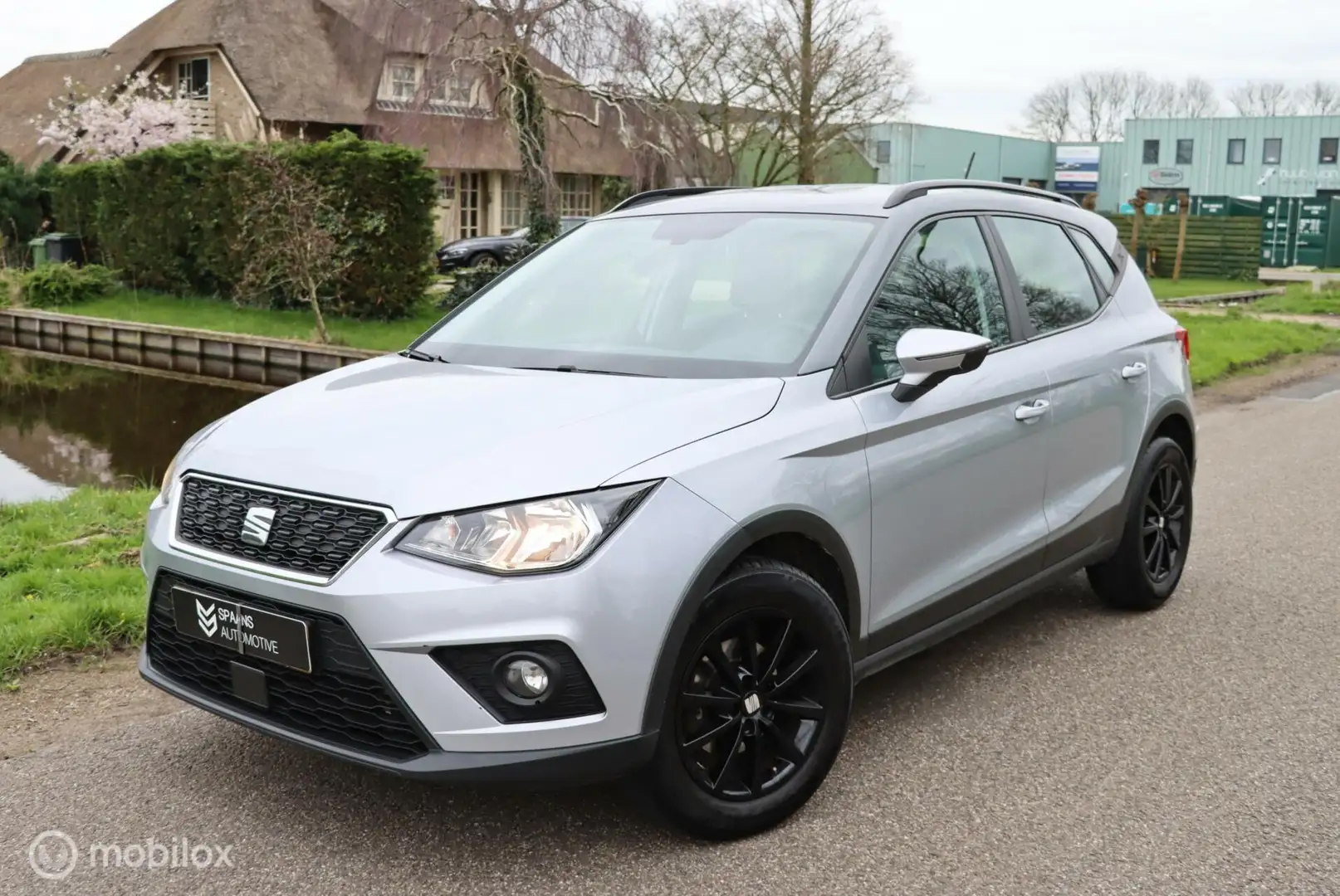 SEAT Arona 1.0 TSI Xcellence / Cruise / Navi / Carplay / PDC Grijs - 1