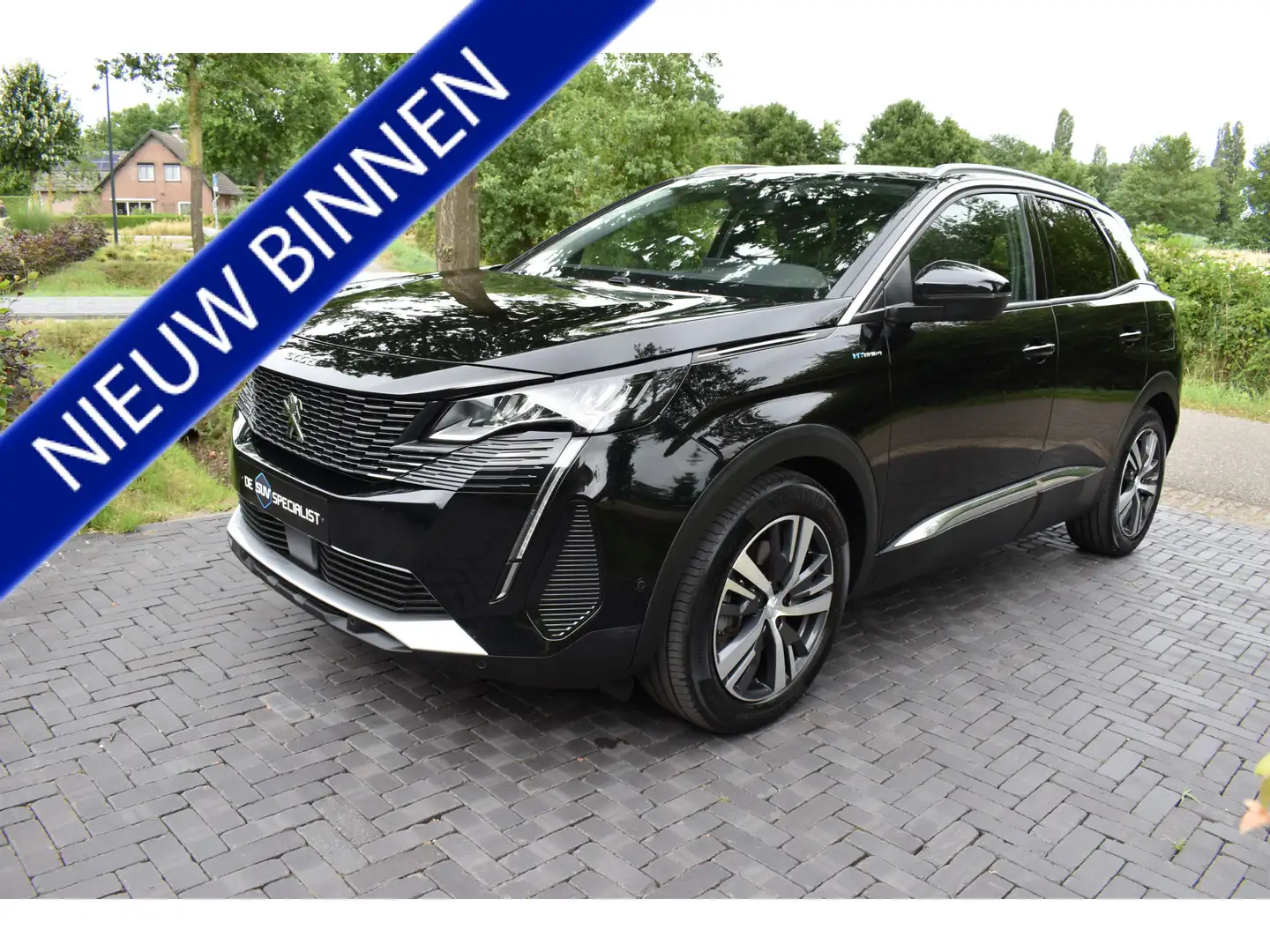 Peugeot 3008 1.6 HYbrid4 300 GT '22 200PK 4WD, AUT. LEER NIEUWS Noir - 1