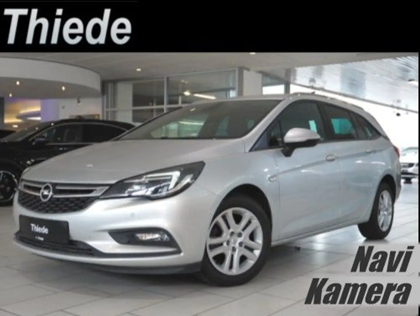 Opel Astra K ST 1.4T ON NAVI/LED/KAMERA/SPORT/SH/TEMP Silber - 1