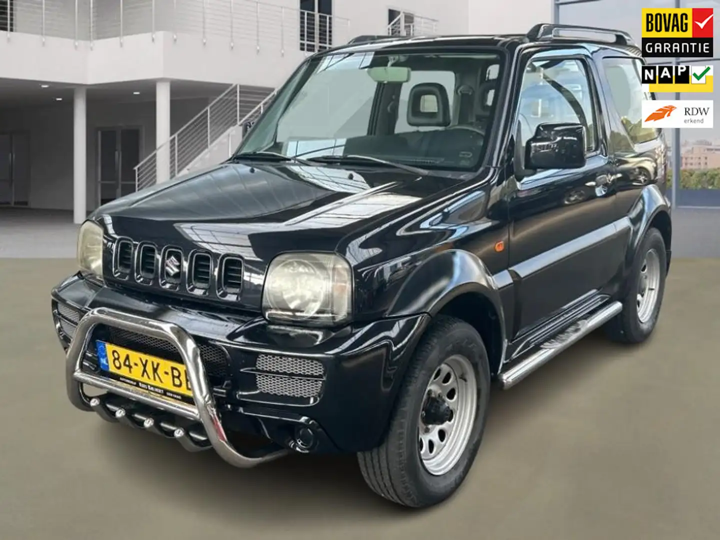 Suzuki Jimny 1.3 JLX 106.400 km + NAP NL-auto Zwart - 1