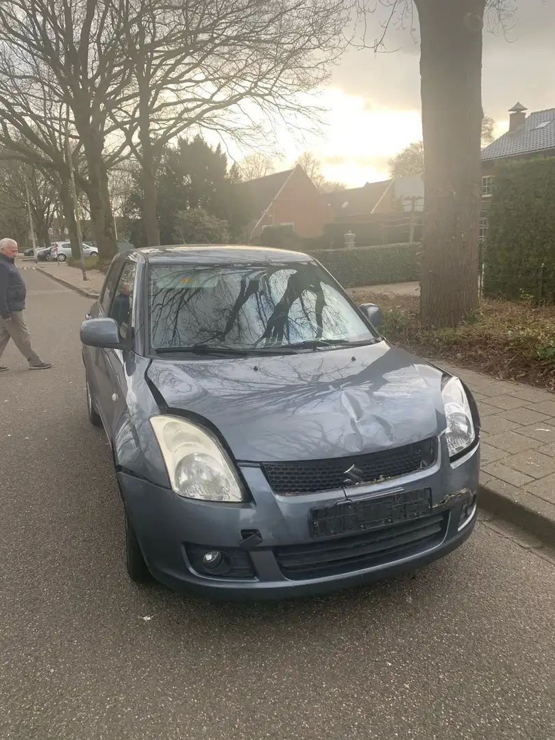 Suzuki Swift 1.3 Grijs - 1