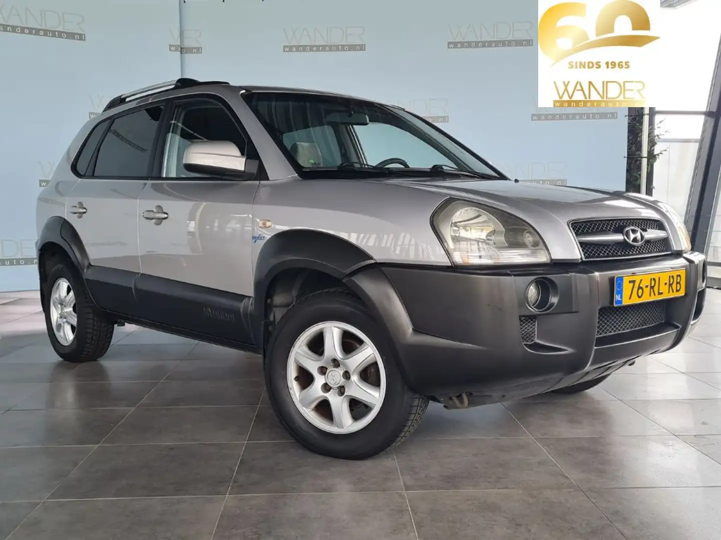 Hyundai TUCSON 2.0i Dynamic /Airco/Trekhaak Grijs - 1