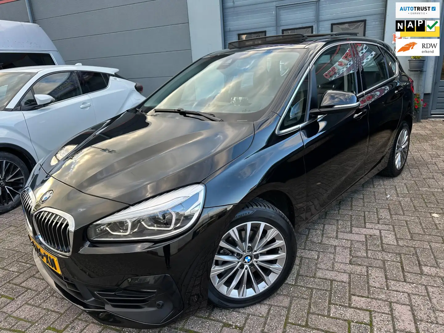 BMW 218 2-serie Active Tourer 218i 2021 HIGH-EXE SPORT EDI Zwart - 1