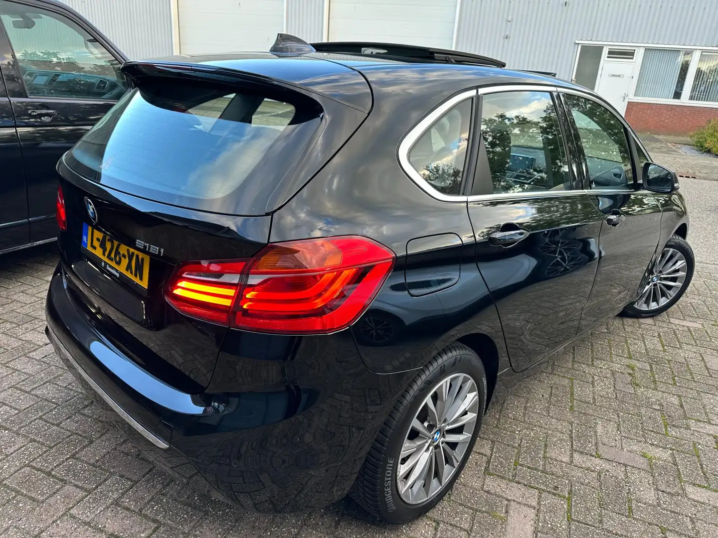 BMW 218 2-serie Active Tourer 218i 2021 HIGH-EXE SPORT EDI Zwart - 2