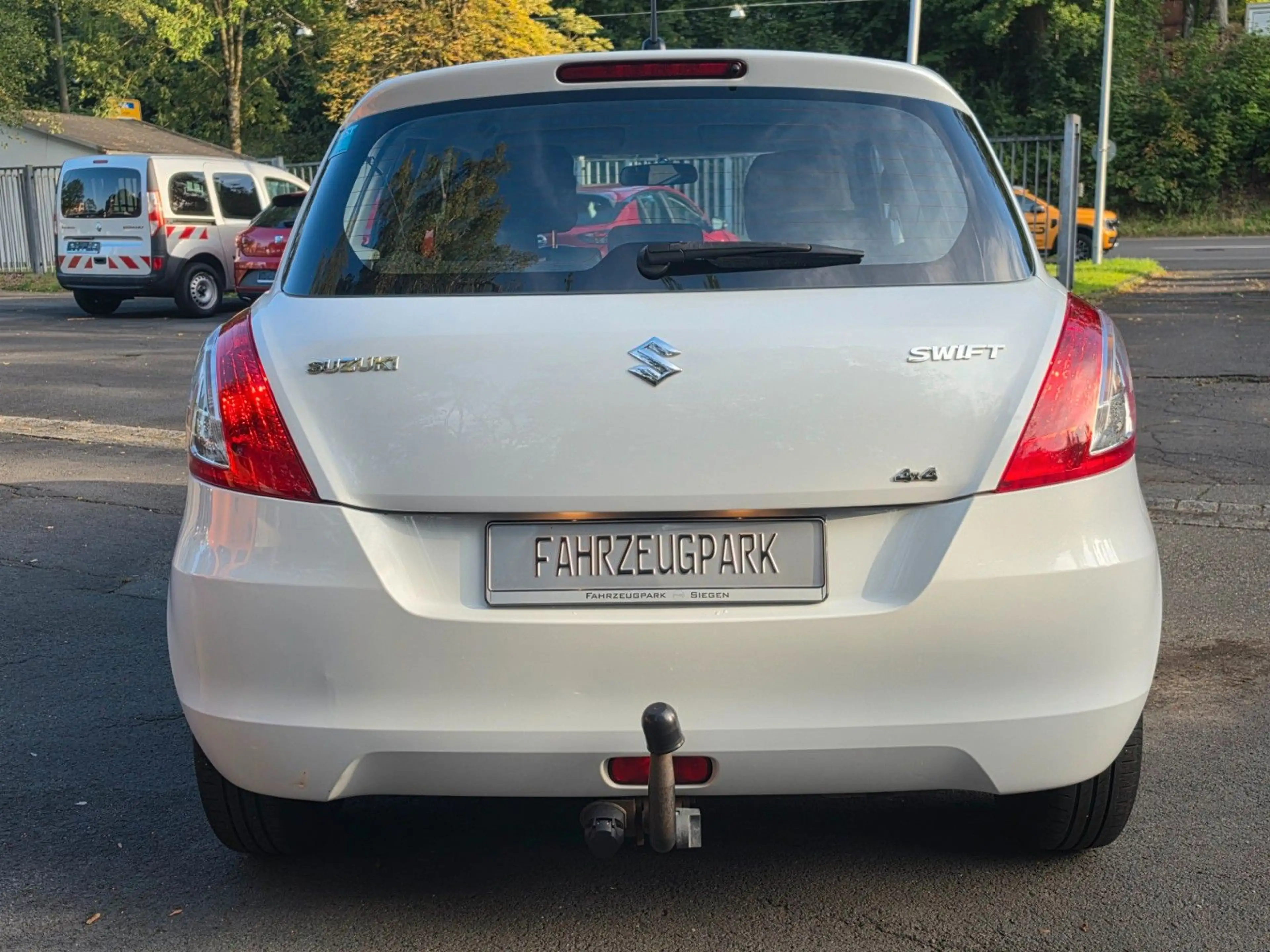 Suzuki Swift Club 4x4*SHZ*AHK* — photo 2